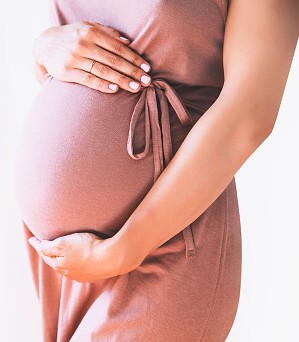 An expecting mother on a safe, supported journey to birth