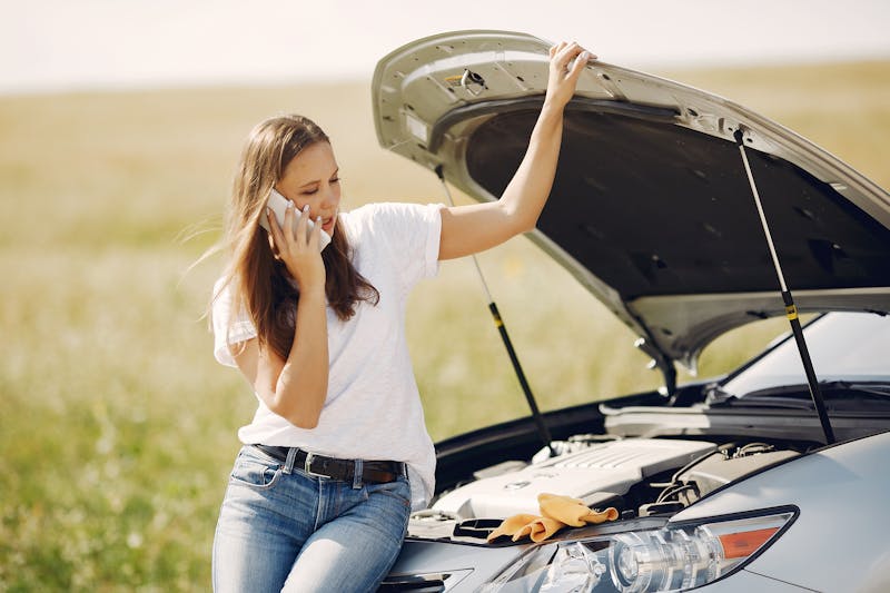A driver stranded on the roadside calling for help