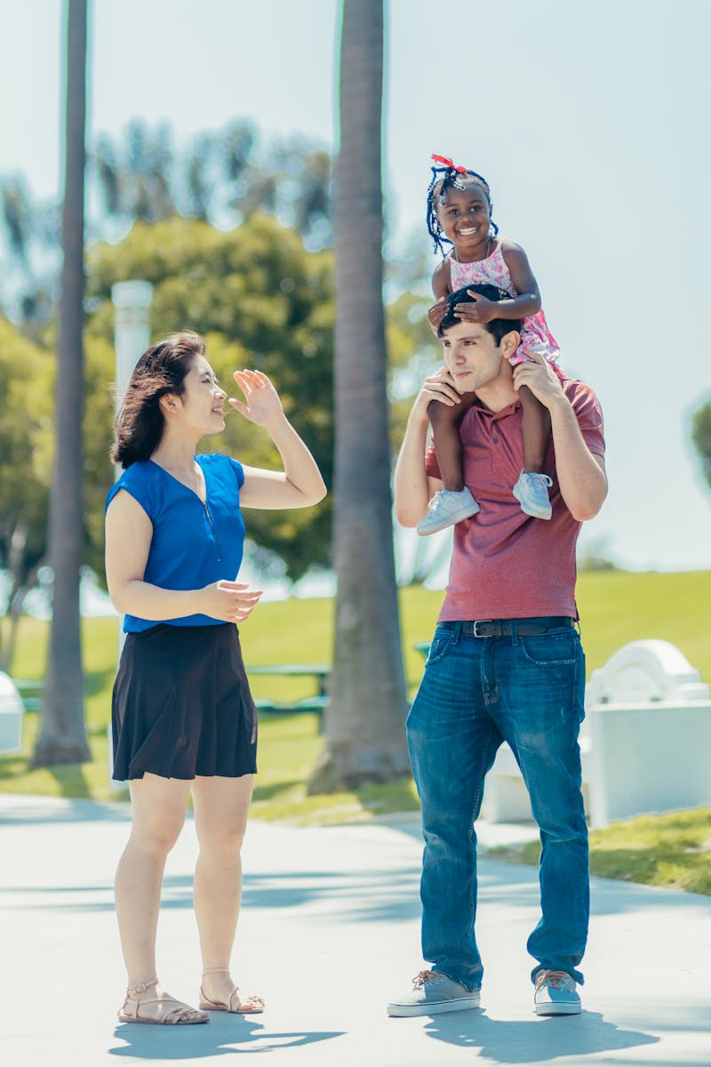 A multiracial family together outdoors
