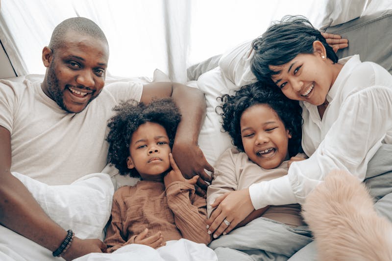 A multiracial family in a public park