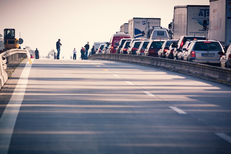 Traffic stopped on a highway, delaying transport